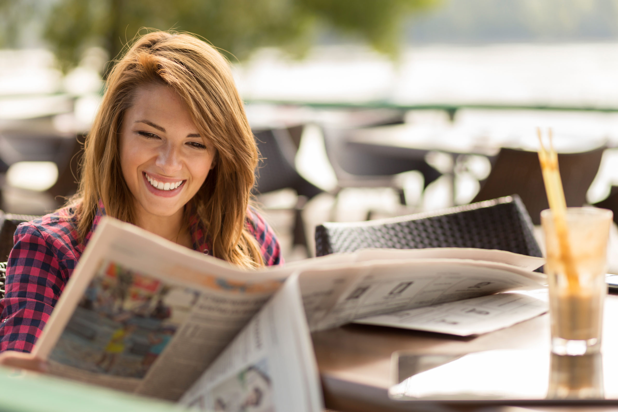 Woman reading newspaper